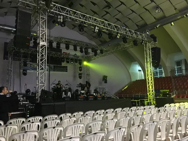 Arena stage with truss and line arrays
